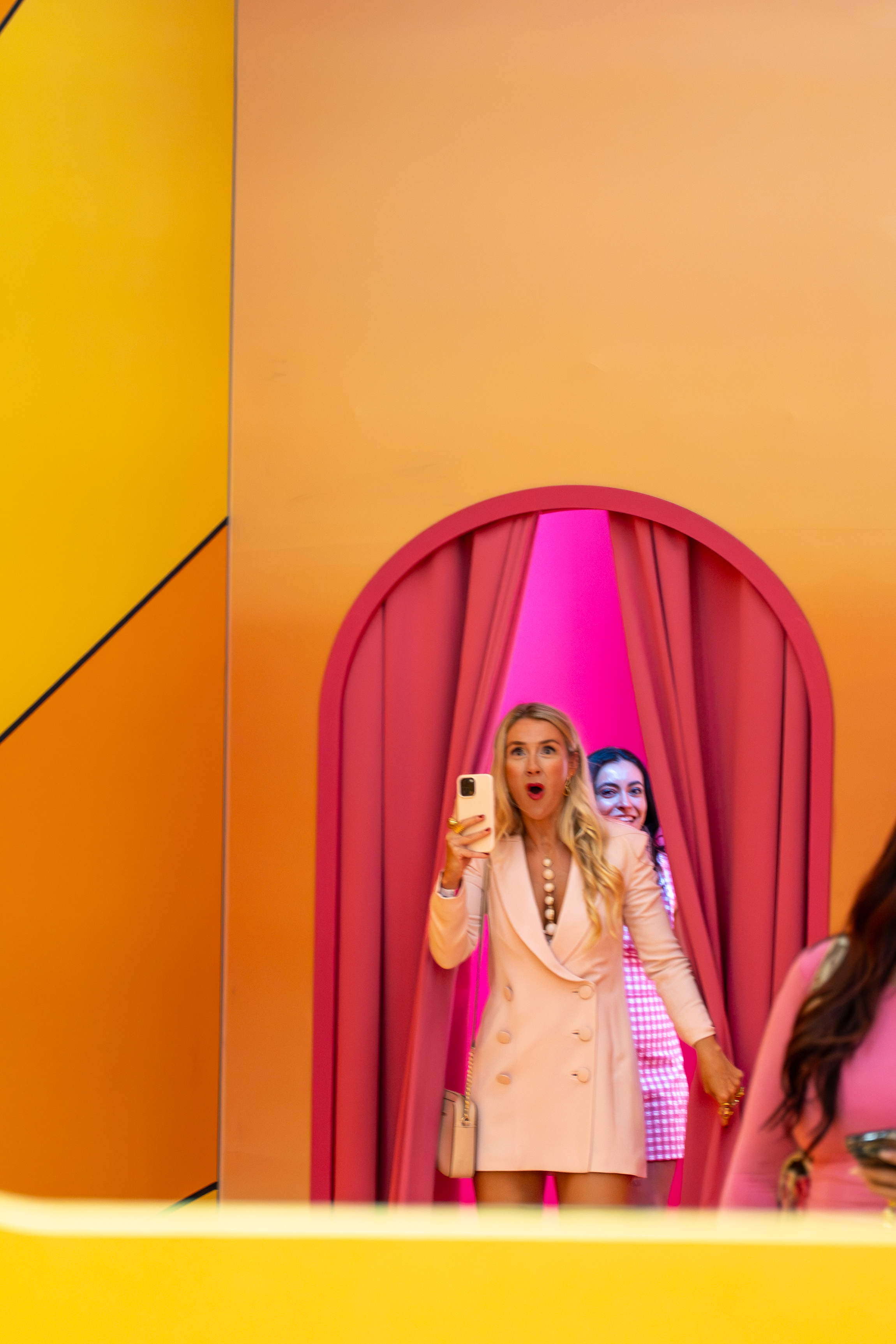 woman-surpised-entering-barbie-experience-museum