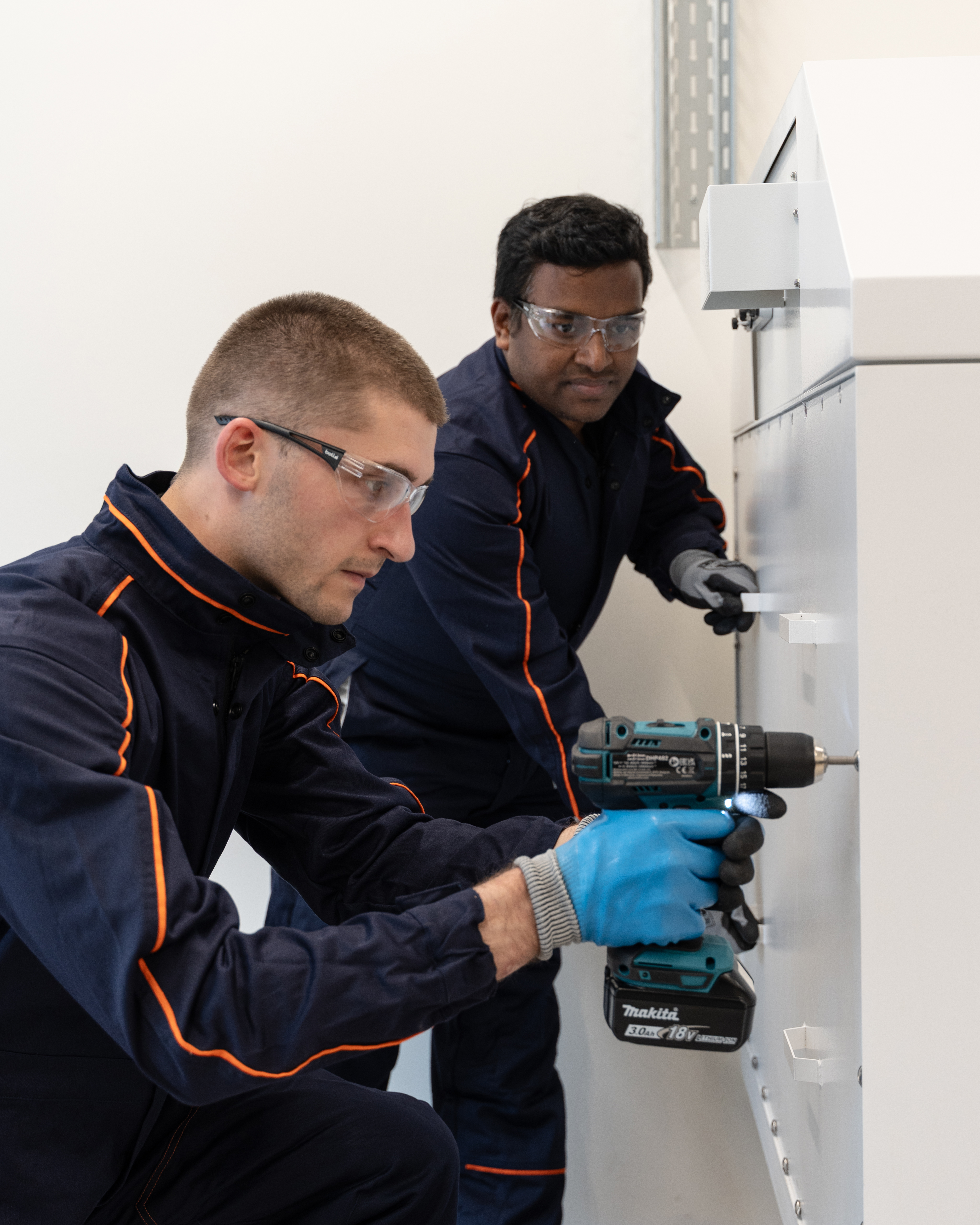 Engineering team at work drilling